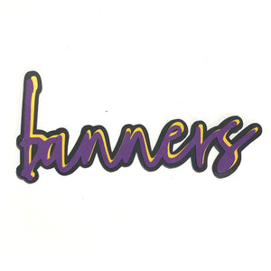 the word BANNERS is shown in purple handwritten font with yellow highlights and black tracing, all cut from paper. shown on a white background
