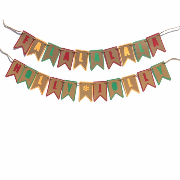 Two festive banners are hung against a white background.  Each banner is cut from red, yellow, green and brown paper.  The top one reads FALALALALA and the bottom one reads HOLLY JOLLY