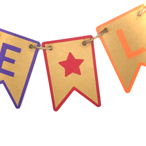 A close up look of the star separator tab, which has a kraft brown top layer and red bottom layer.  The star is cut from the brown layer so the red shows through.  the red is also a little bigger that the brown, create a red edge effect.  you can also see the letter E in purple to the left and the letter L in Orange to the right.  All against a white background